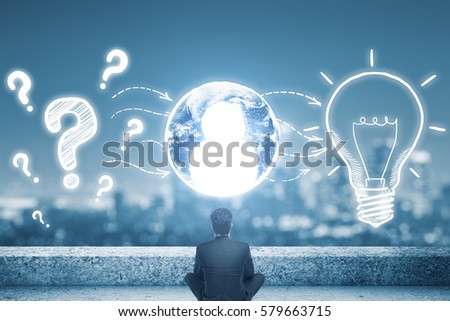 Employer looking for employees with creative ideas on concrete rooftop with blurry city view. HR concept. Elements of this image furnished by NASA