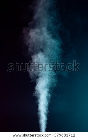 Blue vapor on the black background 