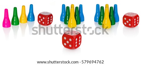 Colored pawns and red dice. Set pieces in the colors yellow, green, blue. Cube in red with white eyes. Set on a white background with slight reflection. On objects slight light reflections.