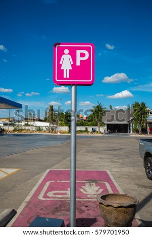 Parking spaces for lady in the gas station.