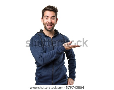 young man pointing space