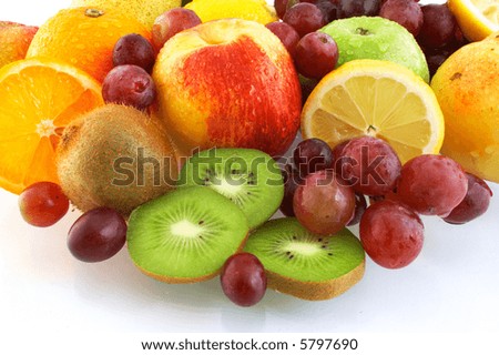 Delicious fresh fruits on white background and reflection