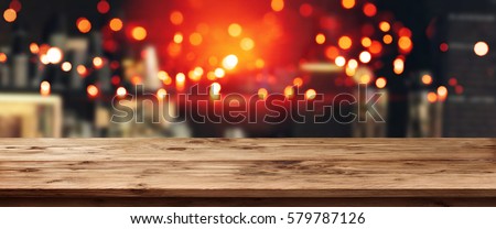Panorama background for a pub at night in front of an empty wooden table