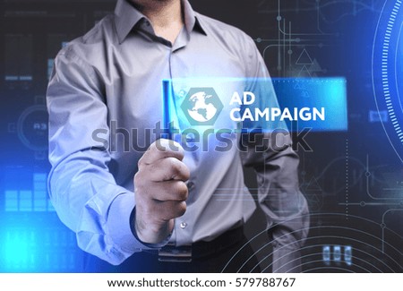 Business, Technology, Internet and network concept. Young businessman showing a word in a virtual tablet of the future: Ad campaign