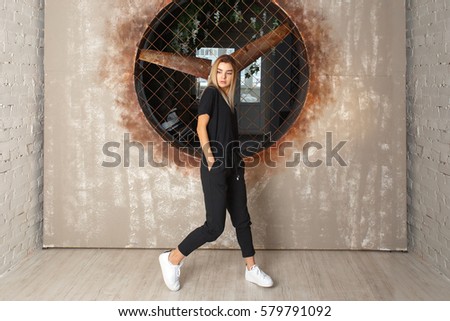 Street dance girl dancer on textured background