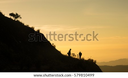 Photographer taking photo on highest mountain view
