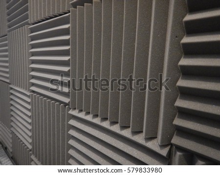 Acoustical foam or tiles for sound dampening. Music room. Soundproof room. Low key photo.