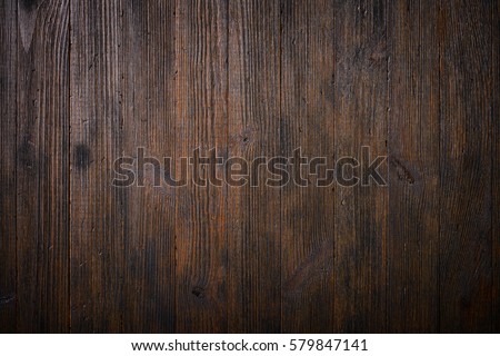 Dark old wooden table texture background top view Royalty-Free Stock Photo #579847141