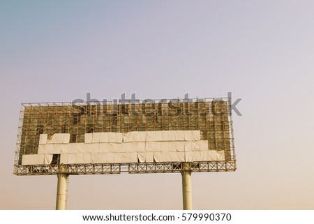 billboard structure on blue sky background in evening scene