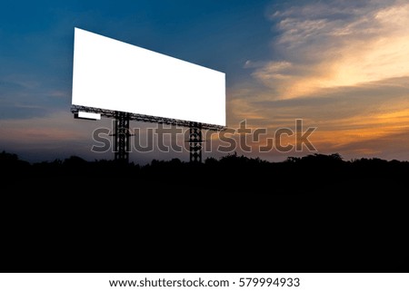 Blank billboard with sky at sunset ready for new advertisement.
