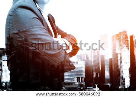 Double exposure of success businessman with city landscape background,  for text and advertise