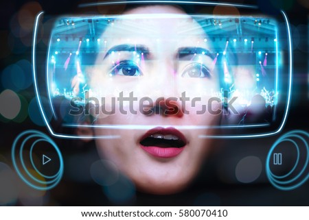 Virtual Reality Glasses Using By Young Women See a Beautiful Illustration light colors of Concert Royalty-Free Stock Photo #580070410