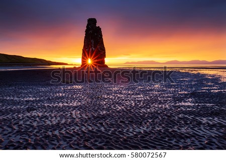 Magic dark sand after the tide. Dramatic and gorgeous scene. Location place Hvitserkur, Vatnsnes peninsula, northwest island Iceland, Europe. Popular tourist attraction. Discover the world of beauty.