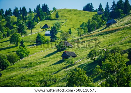 beautiful landscape ,blue sky ,sunny day ,small cottages