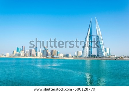 Skyline of Manama dominated by the World trade Center building, Bahrain. Royalty-Free Stock Photo #580128790