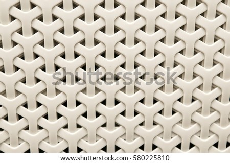 Element white wicker laundry baskets pattern, close-up.
