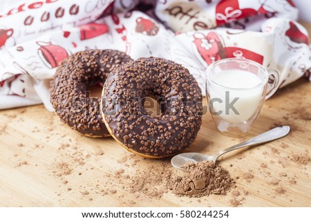 Sweet doughnuts on wooden table