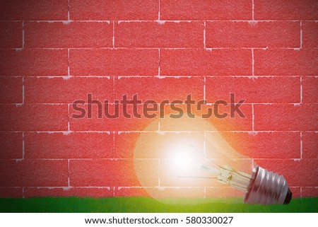 Idea and inspiration concept, business creativity, light bulb on green grass with copy space