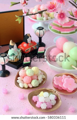 Japanese confectionery for Dolls' Festival on pink background
 