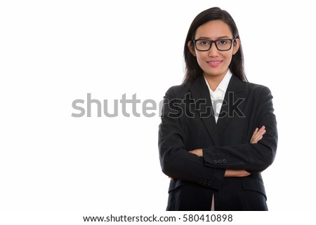 Studio shot of young beautiful Asian businesswoman