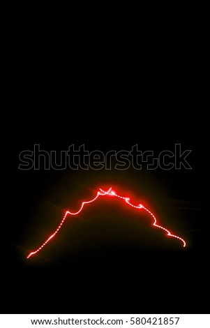 Laser beam red on a black background 