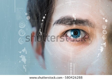 man's eye and technological concept, smart contact lens Royalty-Free Stock Photo #580426288