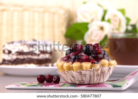 cake in a basket with berries