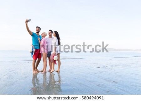 Young People Group On Beach Taking Selfie Photo On Cell Smart Phone Summer Vacation, Happy Smiling Friends Sea Holiday Ocean Travel