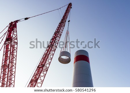 Construction of a wind turbine on a field / Hatzenbuehl, Rhineland-Palatinate, germany, Europe Royalty-Free Stock Photo #580541296