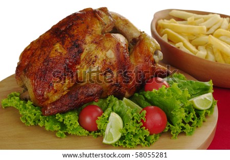 Roasted chicken with lettuce, cherry tomatoes and french fries (Selective Focus, Isolated)