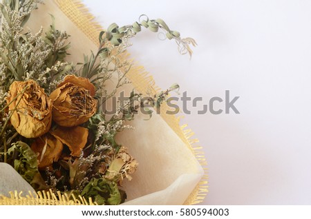 A bouquet of dried flower on white background