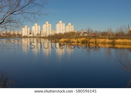 city between the sky and water. blue background