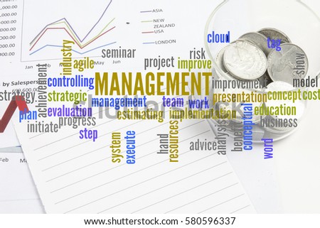 Project management with office stationery  around the word cloud. Analysis and planning keywords.