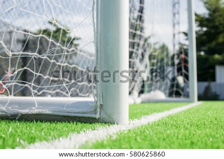soccer ball green grass field, soccer line Royalty-Free Stock Photo #580625860