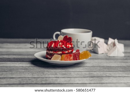 sweet cake, candy, on a wooden background