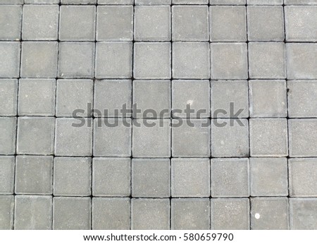 Soft focused picture of Concrete block or Road Cement Brick Block Background Texture