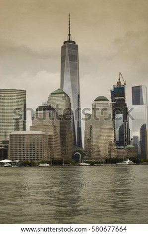 New York City Manhattan skyline of the city taken from the river in a rainstorm day