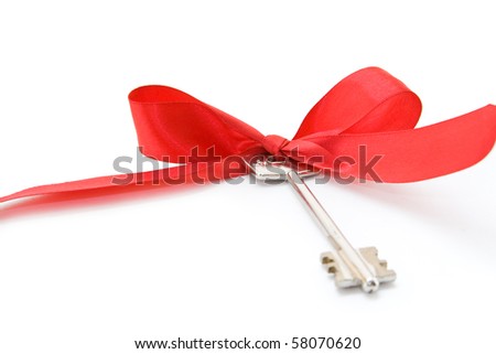 House keys with red ribbon