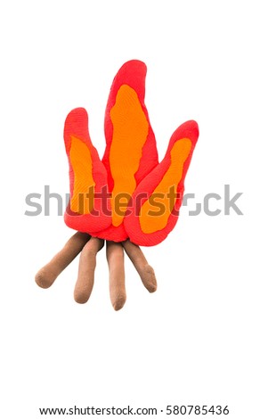 Red Fire made from plasticine on white isolated background
