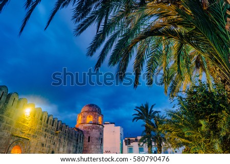 Night photo of Mosque in Sousse. Medieval architecture in night lights. Vivid picture of ancient religious building - one of the main attractions in Sousse, Tunisia.