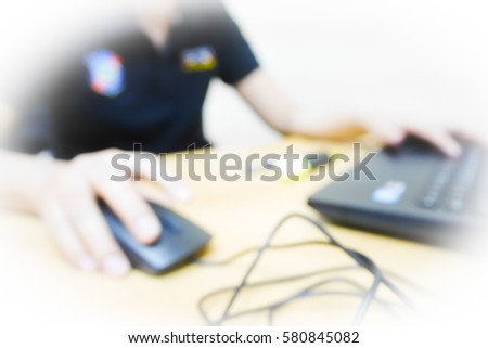 Picture blurred  for background abstract and can be illustration to article of officer working computer