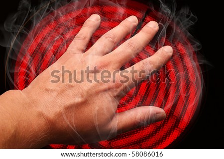 Hand burned on a stove Royalty-Free Stock Photo #58086016