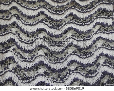 Knitted texture. Zigzag. Wave.