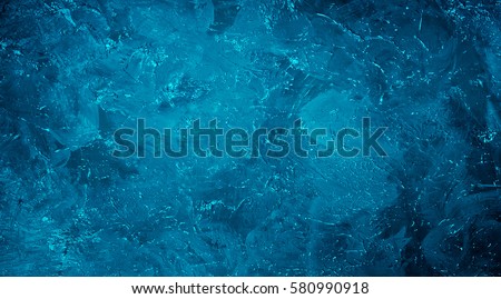 Abstract Grunge Decorative dark Navy Blue Painted Stucco Wall Texture. Handmade Rough Winter Christmas Paper Background With Copy Space. Wide Horizontal Image