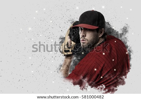 Pitcher Baseball Player with a red uniform coming out of a blast of smoke .