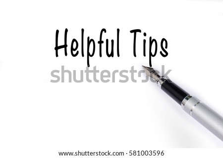 Fountain pen writing the word Helpful Tips on white paper.