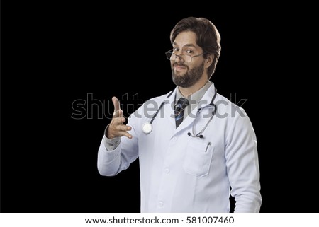 Male doctor signaling that there may be a problem on a black background.