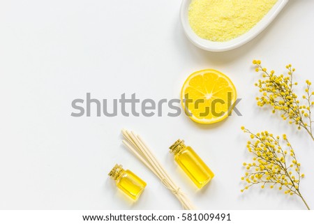 Natural cosmetic seasalt and oil on white background top view mock up