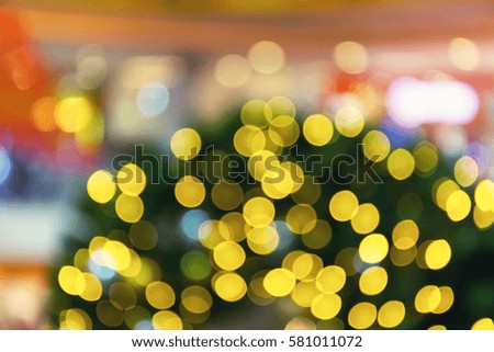 Bokeh blurred photo of christmas tree for background.
