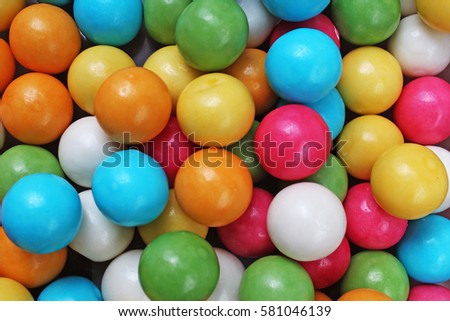 Retro vintage bubblegum balls. Bubble gum chewing gum texture. Rainbow multicolored gumballs chewing gums as background Round sugar coated candy dragee bubblegum texture. Colorful bubblegums wallpaper